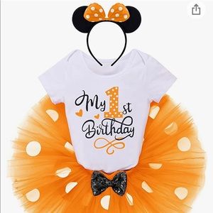 My 1st birthday outfit. Includes onesie, skirt, and ears.